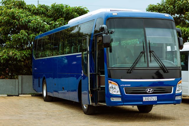A bus parked in a car park.