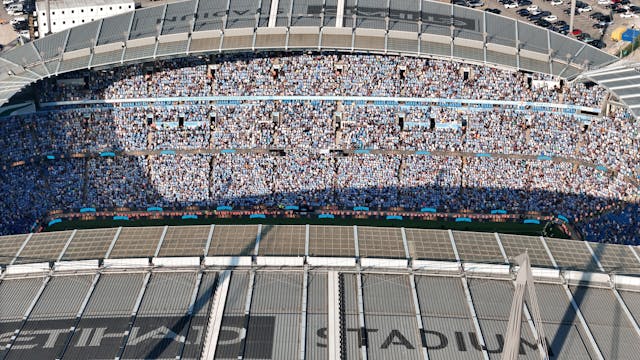 An aerial view of Manchester City fans in the Etihad Stadium.
